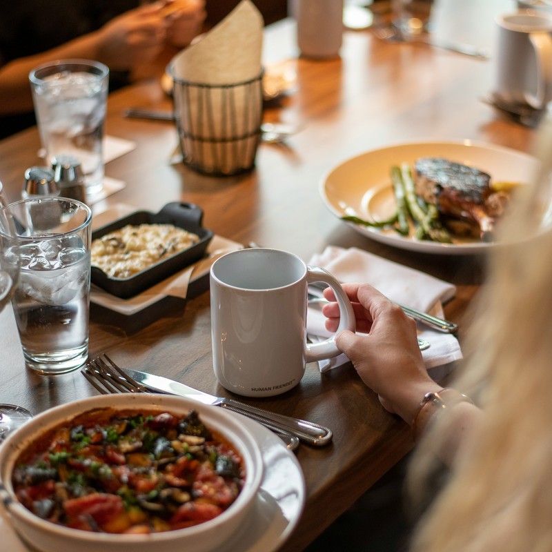 Restaurant table with multiple dishes.